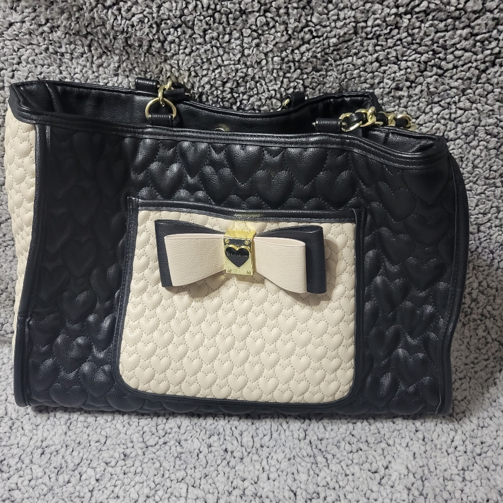 Betsy John's purse
